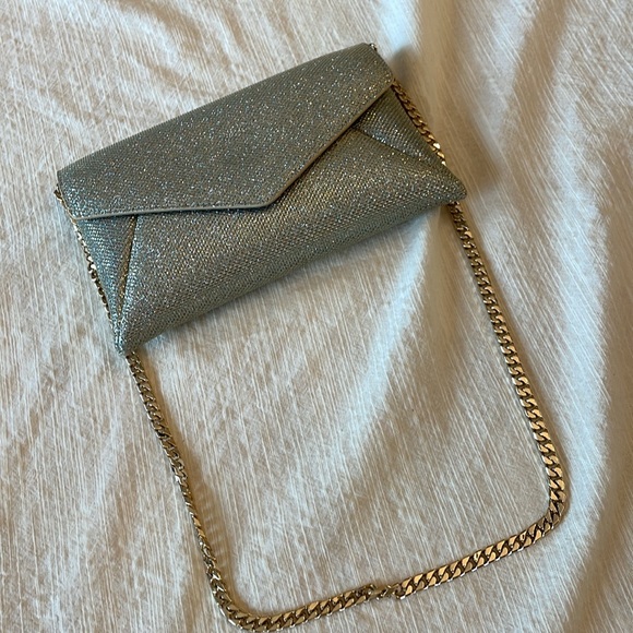 STUART WEITZMAN
The Loveletter Mini Metallic Clutch Bag - Picture 10 of 11